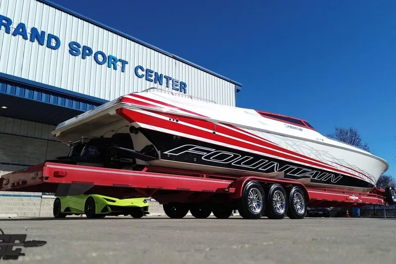 Slide: The Image of 2009 Fountain 47 Lightning boat on red trailer at Grand Sport Center. - 35