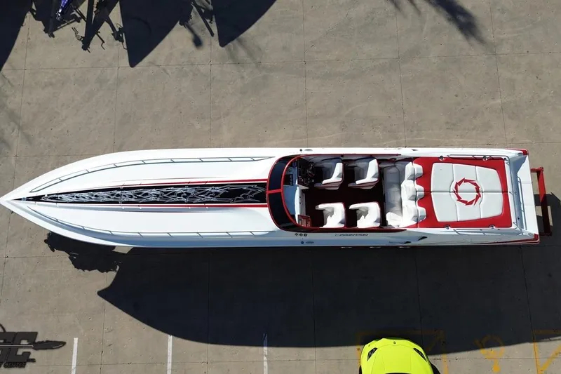 Slide: The Image of Aerial view of 2009 Fountain 47 Lightning speedboat with sleek design and red accents. - 36