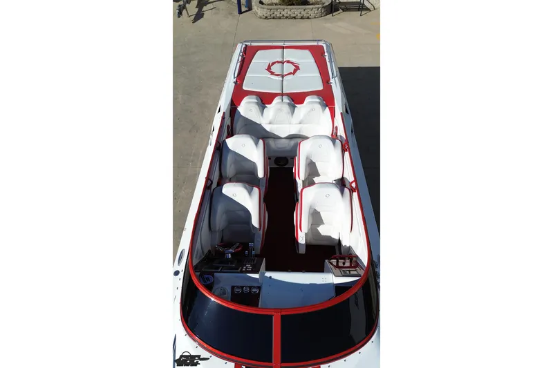 Slide: The Image of 2009 Fountain 47 Lightning boat interior with white and red seating, viewed from above. - 45