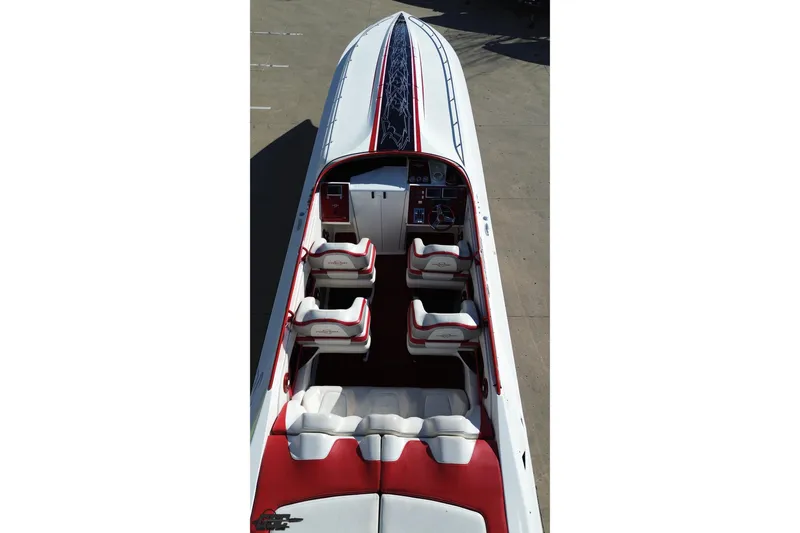 Slide: The Image of 2009 Fountain 47 Lightning speedboat with red and white interior, aerial view. - 47