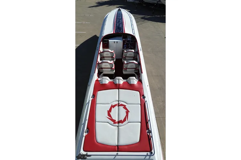 Slide: The Image of 2009 Fountain 47 Lightning boat with red and white seating, viewed from above. - 48