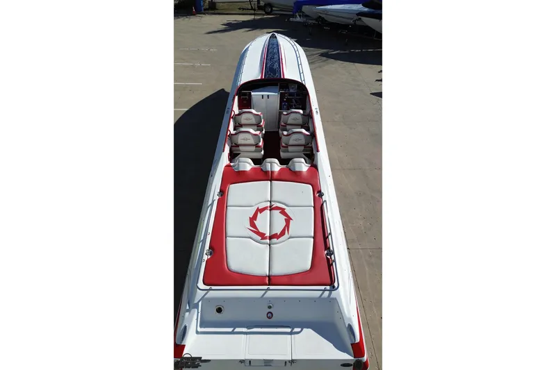 Slide: The Image of 2009 Fountain 47 Lightning boat with red and white seating, viewed from above. - 49