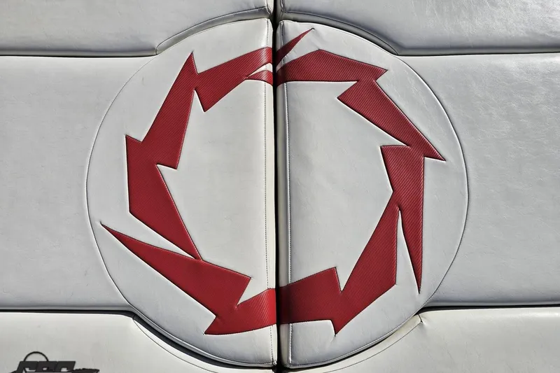 Slide: The Image of Red lightning bolt design on white upholstery of 2009 Fountain 47 Lightning boat. - 52