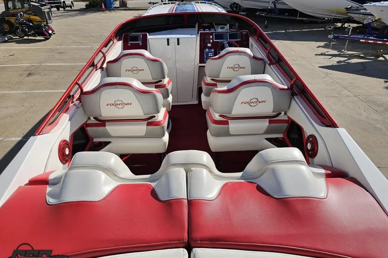 Slide: The Image of 2009 Fountain 47 Lightning boat interior with red and white seating, showcasing luxury design. - 53