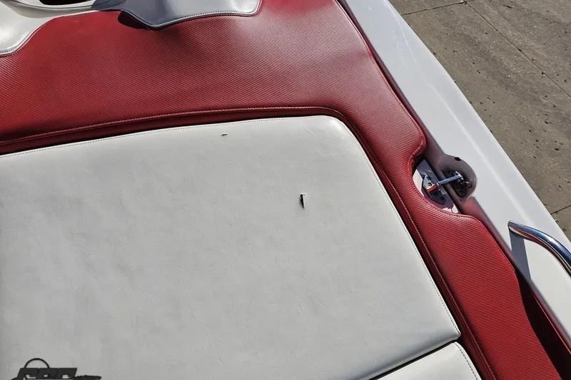 Slide: The Image of Red and white upholstery on 2009 Fountain 47 Lightning boat deck. - 54