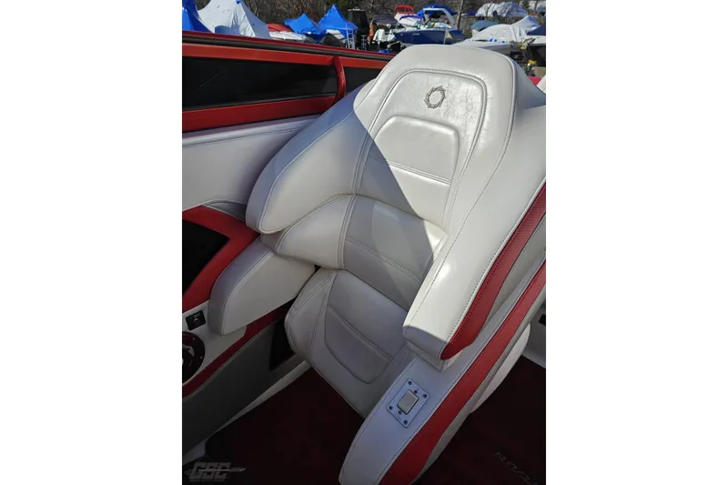 Slide: The Image of 2009 Fountain 47 Lightning boat seat with white and red leather upholstery. - 63