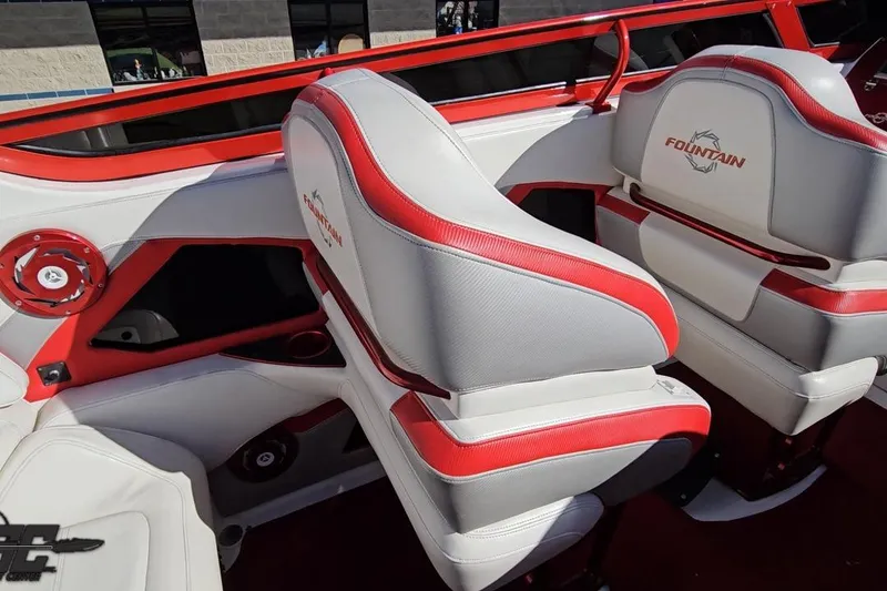 Slide: The Image of 2009 Fountain 47 Lightning boat interior with red and white seating. - 65