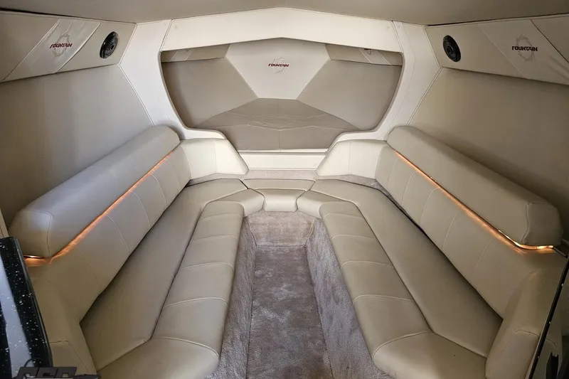 Slide: The Image of Interior of a 2009 Fountain 47 Lightning boat with beige leather seating. - 94