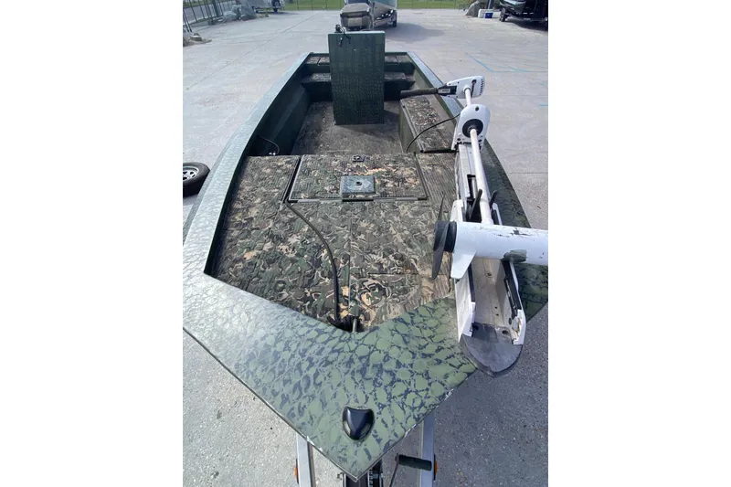 Slide: The Image of Custom 2016 Charles Leonard Skiff with camouflage design and mounted trolling motor. - 10