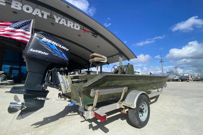 Slide: The Image of Custom 2016 Charles Leonard Skiff with Mercury Saltwater engine at boat yard. - 3