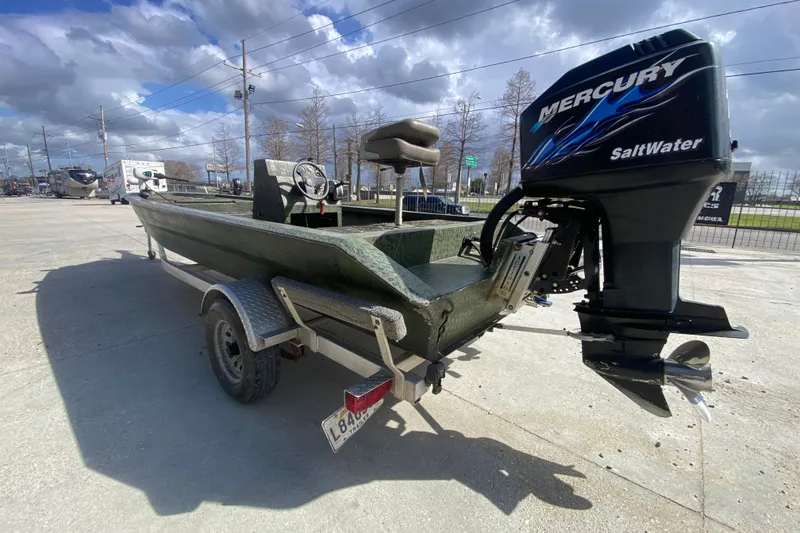Slide: The Image of Custom 2016 Charles Leonard Skiff with Mercury SaltWater engine on trailer. - 5