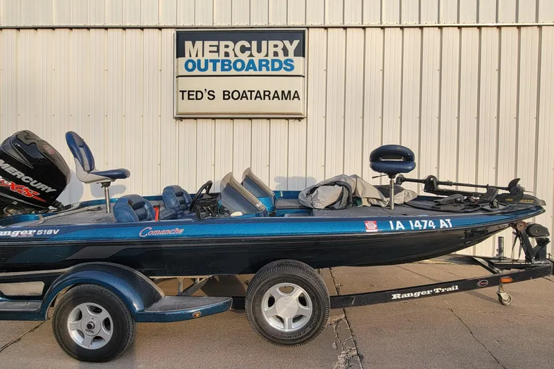 Slide: The Image of 2001 Ranger 518DVX Comanche boat on trailer at Ted's Boatarama. - 4