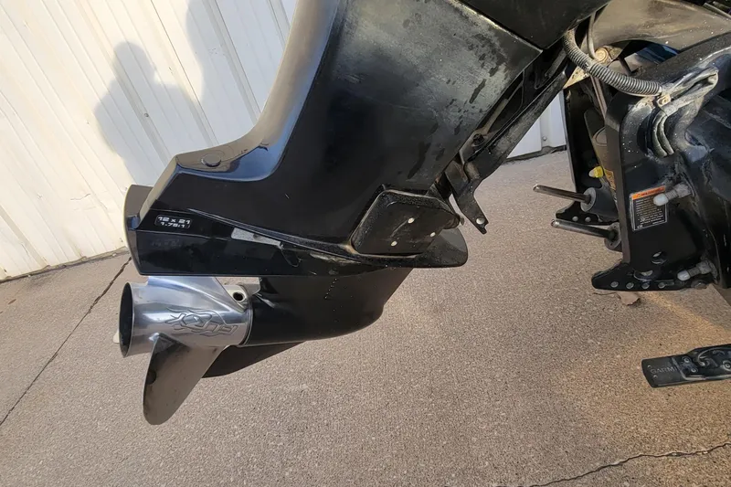 Slide: The Image of Close-up of a 2001 Ranger 518DVX Comanche boat motor and propeller. - 7