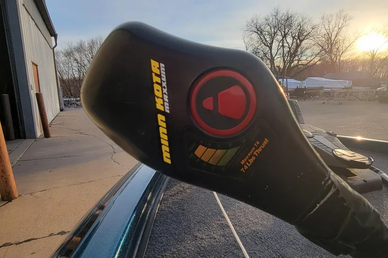 Slide: The Image of Minn Kota Maxxum trolling motor on 2001 Ranger 518DVX Comanche boat at sunset. - 9