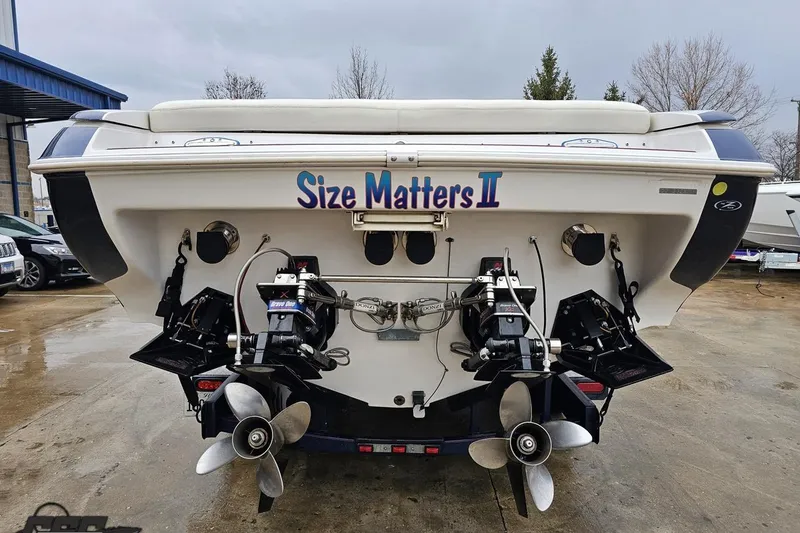 Slide: The Image of Rear view of a 2000 Donzi 33 ZX boat with dual propellers. - 19