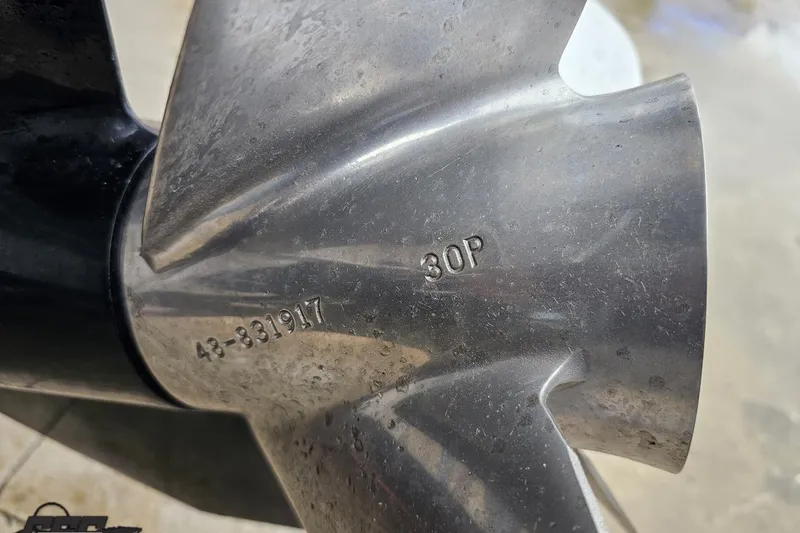 Slide: The Image of Close-up of a 2000 Donzi 33 ZX boat propeller with model number 43-831917. - 22