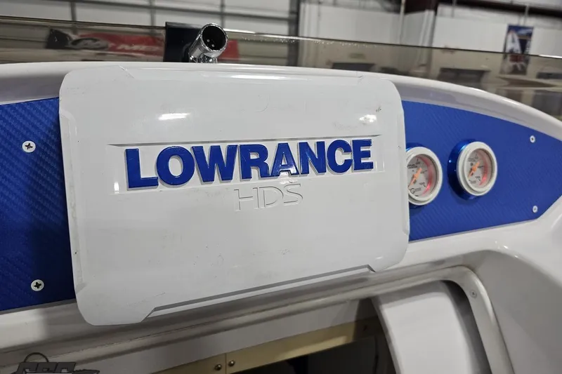 Slide: The Image of Dashboard of 2000 Donzi 33 ZX with Lowrance HDS and gauges. - 55