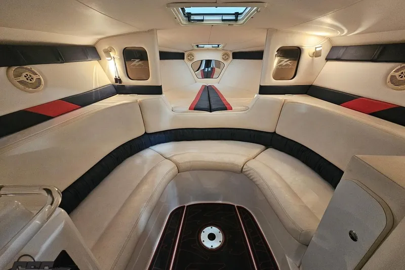 Slide: The Image of Interior of a 2000 Donzi 33 ZX boat with luxurious seating and modern design. - 61