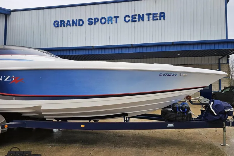 Slide: The Image of 2000 Donzi 33 ZX boat on trailer at Grand Sport Center. - 7