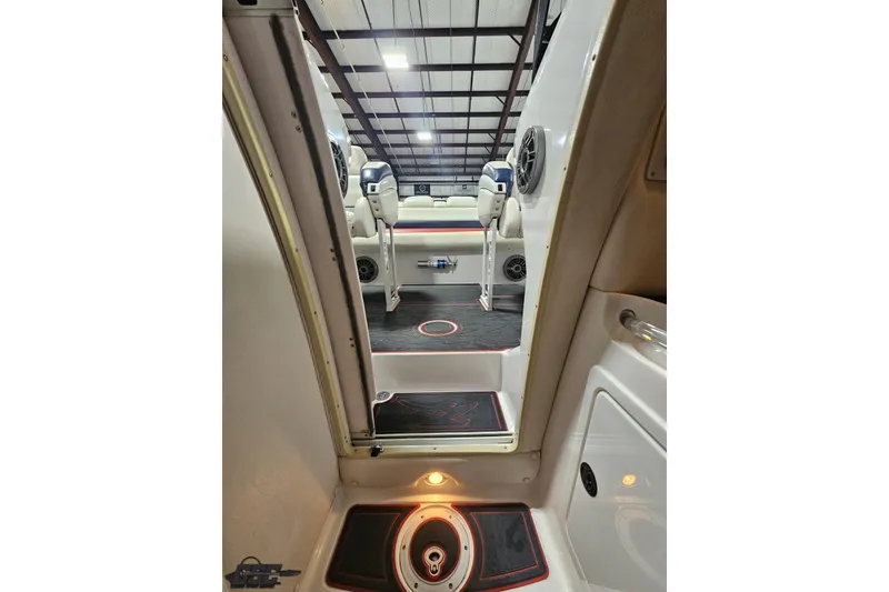 Slide: The Image of Interior view of 2000 Donzi 33 ZX boat, showcasing seating and speaker system. - 72