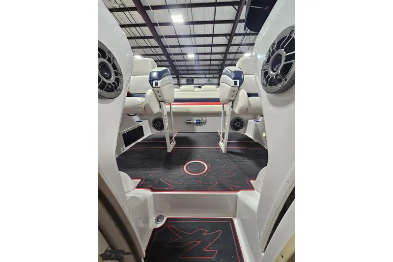 Slide: The Image of Interior of a 2000 Donzi 33 ZX boat with stylish seating and speakers. - 73