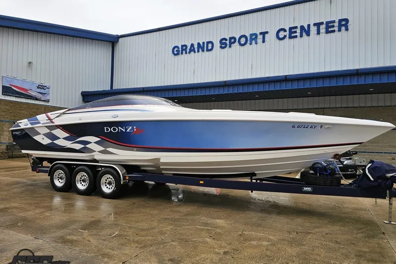 Slide: The Image of 2000 Donzi 33 ZX speedboat on trailer at Grand Sport Center. - 8