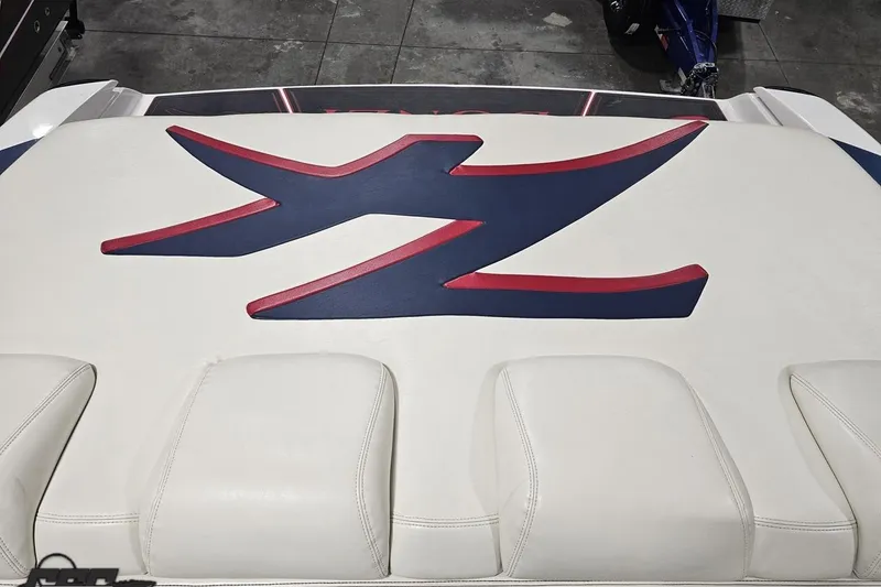 Slide: The Image of 2000 Donzi 33 ZX boat upholstery with bold red and blue "Z" design. - 86