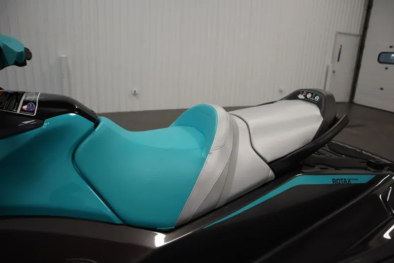 Slide: The Image of 2025 Sea-Doo GTR 230 jet ski with turquoise and gray seating. - 19