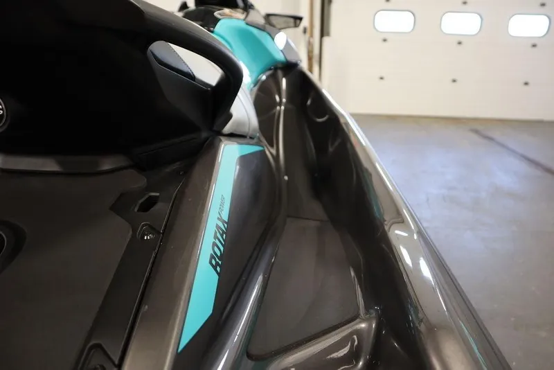 Slide: The Image of 2025 Sea-Doo GTR 230 jet ski, close-up view in a garage setting. - 20