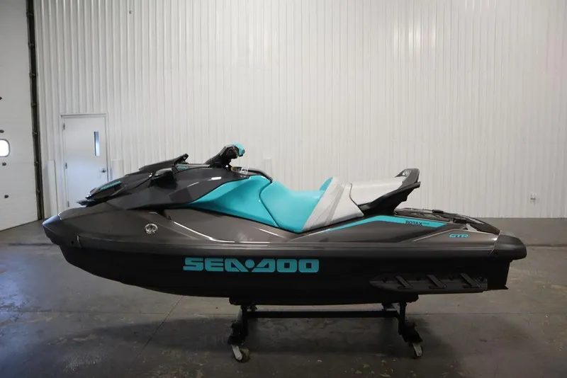 Slide: The Image of 2025 Sea-Doo GTR 230 jet ski in a showroom, featuring sleek design and vibrant colors. - 9
