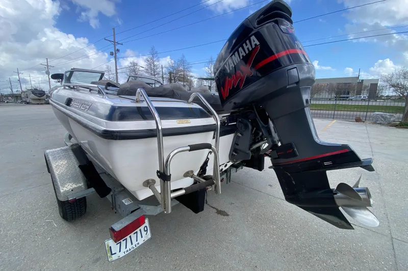 Slide: The Image of 2002 Skeeter SL 190 boat with Yamaha VMAX engine on a trailer. - 6