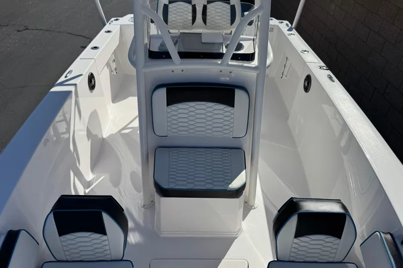 Slide: The Image of 2024 Aquasport 2200 Center Console boat interior with modern seating and console design. - 14