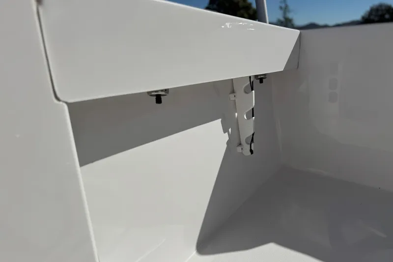 Slide: The Image of 2024 Aquasport 2200 Center Console interior detail, showcasing sleek white finish. - 16