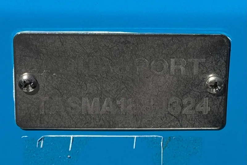 Slide: The Image of 2024 Aquasport 2200 Center Console identification plate on blue background. - 36