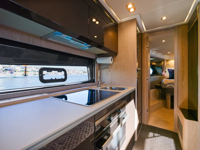 Slide: The Image of Interior of Azimut 51 Atlantis yacht, modern kitchen and bedroom. - 44