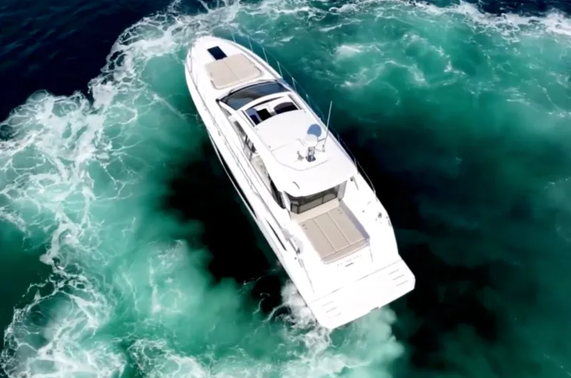 Slide: The Image of 2019 Azimut 51 Atlantis yacht cruising on open sea. - 1