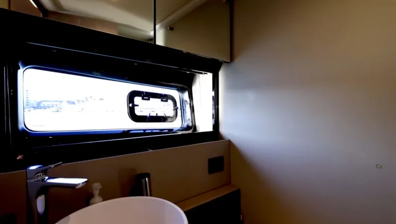 Slide: The Image of Interior of 2019 Azimut 51 Atlantis yacht with modern cockpit. - 28
