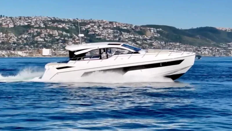 Slide: The Image of 2019 Azimut 51 Atlantis yacht cruising on open sea. - 4