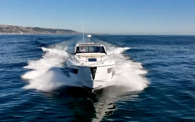 Slide: The Image of 2019 Azimut 51 Atlantis yacht cruising on open sea. - 8