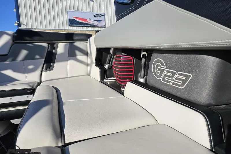 Slide: The Image of Interior of 2015 Nautique Super Air Nautique G23 boat, featuring sleek seating design. - 111