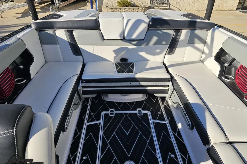 Slide: The Image of 2015 Nautique Super Air Nautique G23 interior with luxurious seating and modern design. - 114
