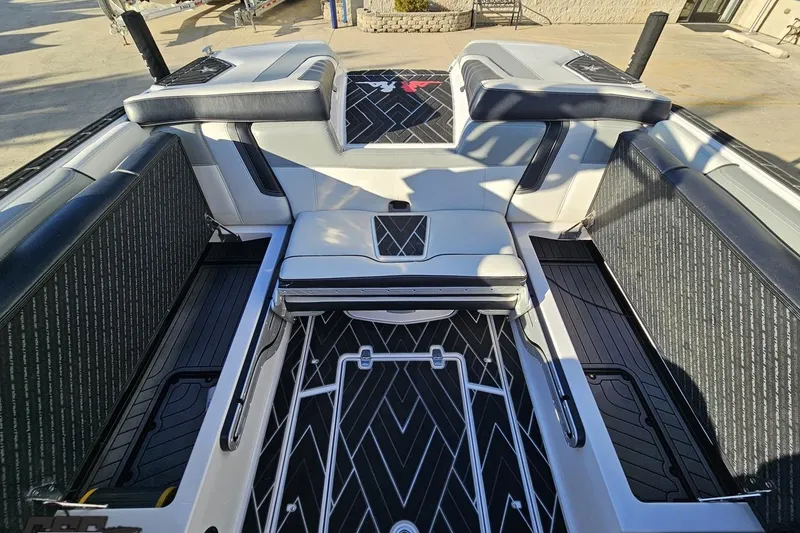 Slide: The Image of 2015 Nautique Super Air Nautique G23 interior with sleek seating and modern design. - 117