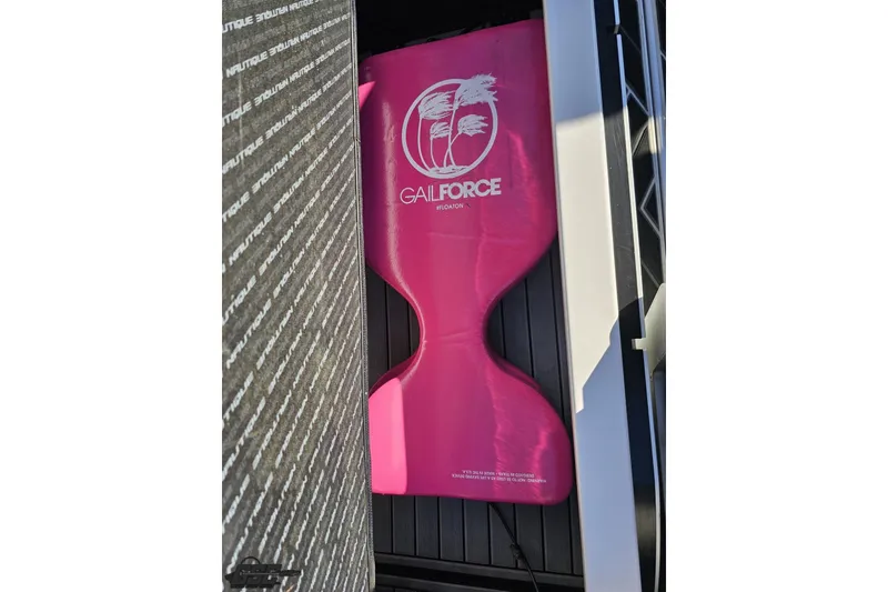 Slide: The Image of Pink Gail Force floatation device on 2015 Nautique Super Air Nautique G23 boat. - 119