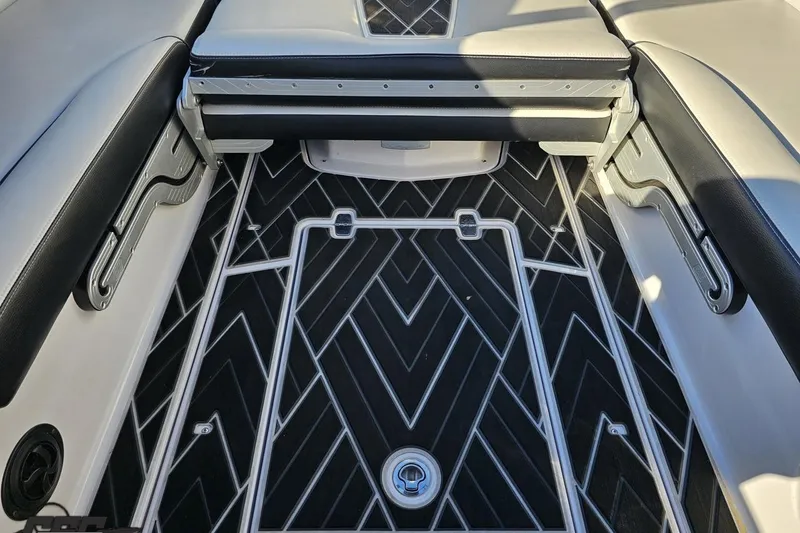 Slide: The Image of 2015 Nautique Super Air Nautique G23 interior with stylish black and white flooring. - 120