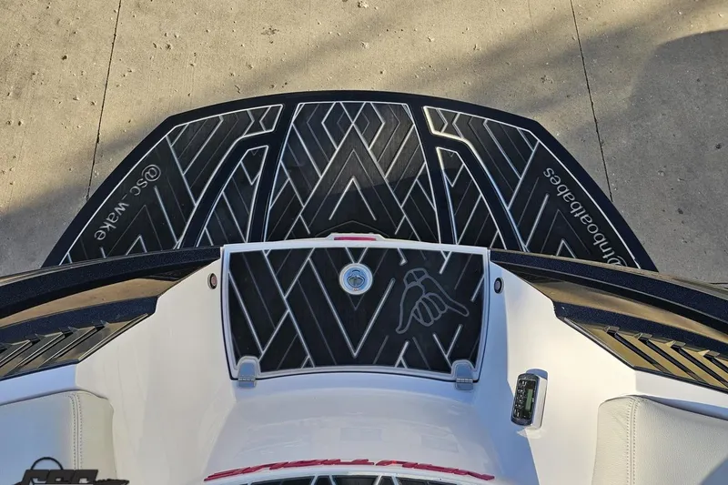 Slide: The Image of 2015 Nautique Super Air Nautique G23 swim platform with custom black traction pads. - 125