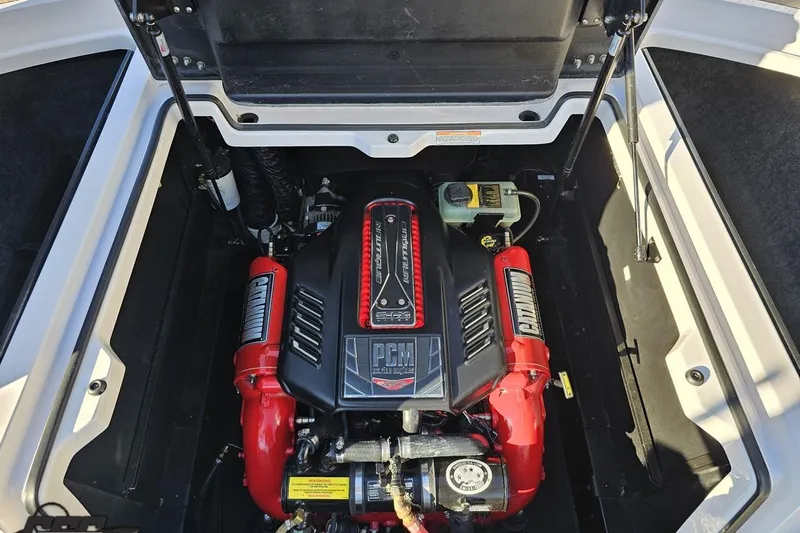 Slide: The Image of 2015 Nautique Super Air Nautique G23 engine compartment with PCM engine. - 128
