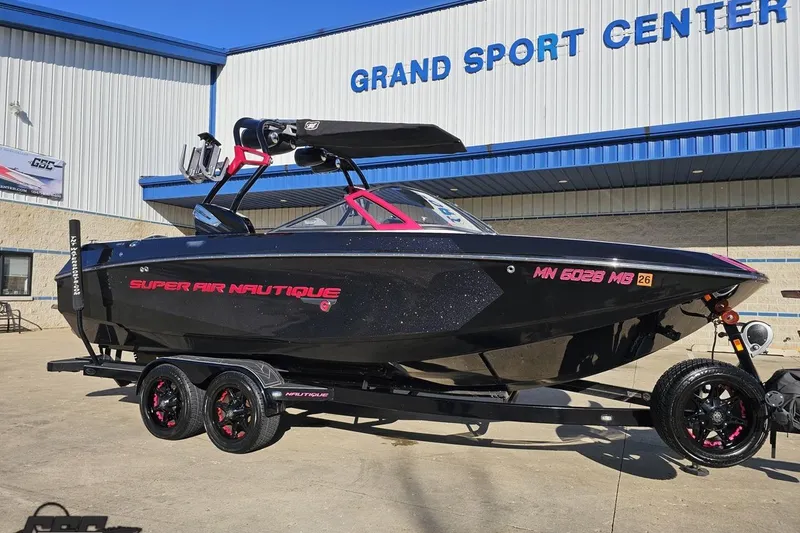 Slide: The Image of 2015 Nautique Super Air Nautique G23 boat on trailer at Grand Sport Center. - 16