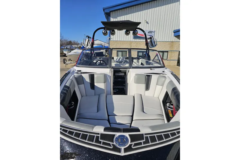 Slide: The Image of 2015 Nautique Super Air Nautique G23 boat interior with sleek seating and modern design. - 21