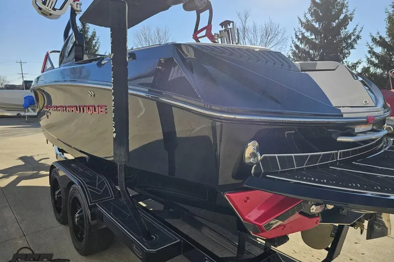 Slide: The Image of 2015 Nautique Super Air Nautique G23 boat on trailer, rear view. - 33
