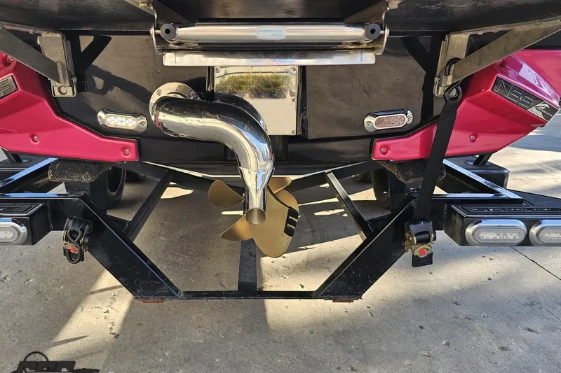 Slide: The Image of Rear view of 2015 Nautique Super Air Nautique G23 boat with propeller and exhaust. - 38